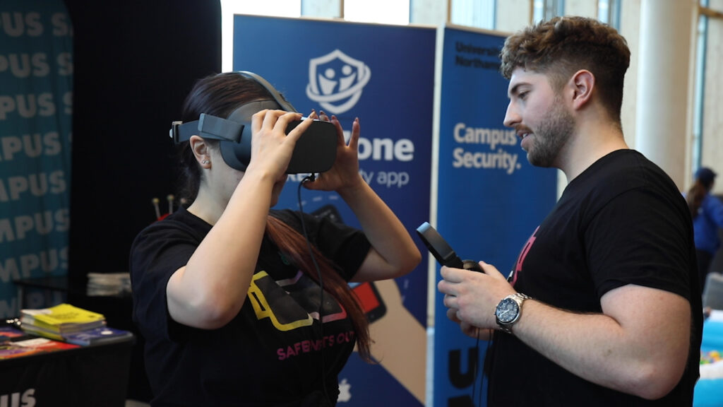 Digital Marketing students demonstrating Safer Northampton VR project at UON open day.