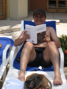 Juan Manuel Salazar reading Tony Covington's new book during Dr Wilkinson's recent tour of Latin America. 